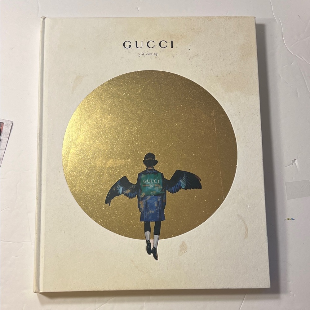 Gucci Gold and Cream Accent Book